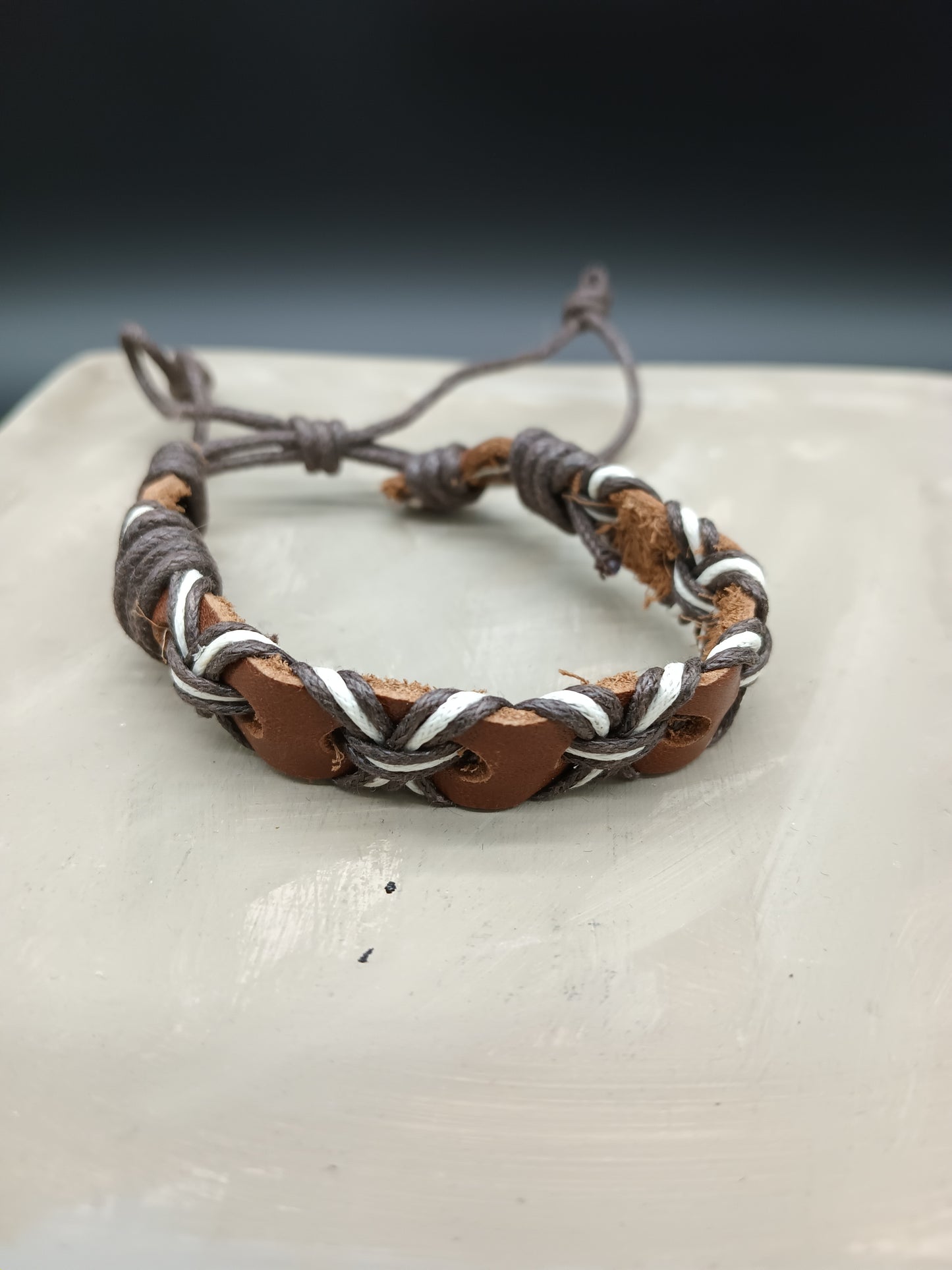 *Light Brown Leather Mens Bracelet With Black and White Cords Interlaced